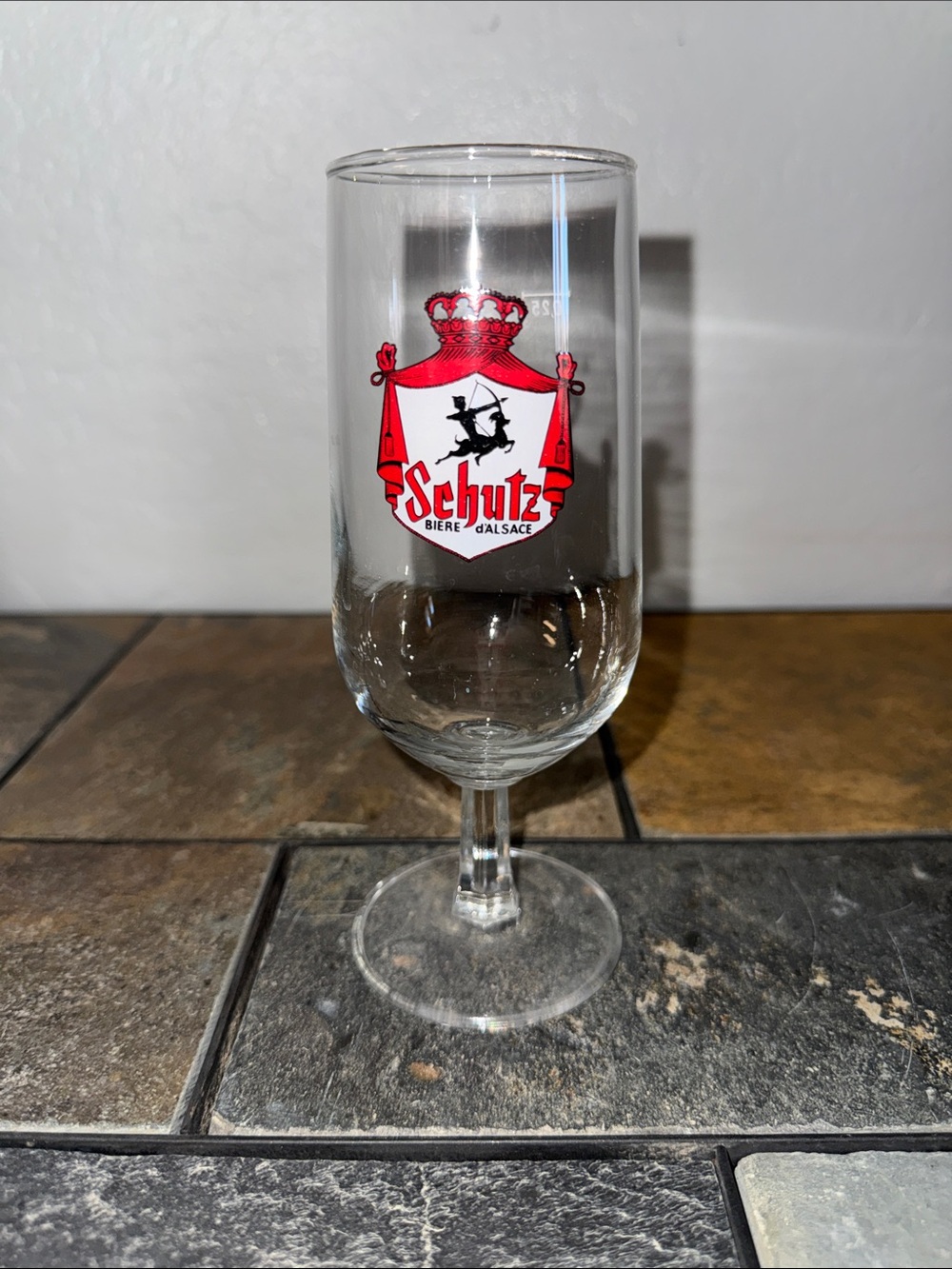 SCHUTZ Clear Stemmed Glass with Red Crest‎ Logo